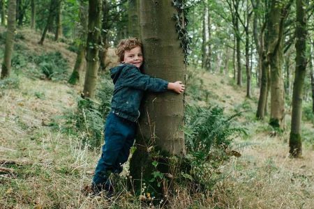Boy hugging a tree | Will writing | LCF Law